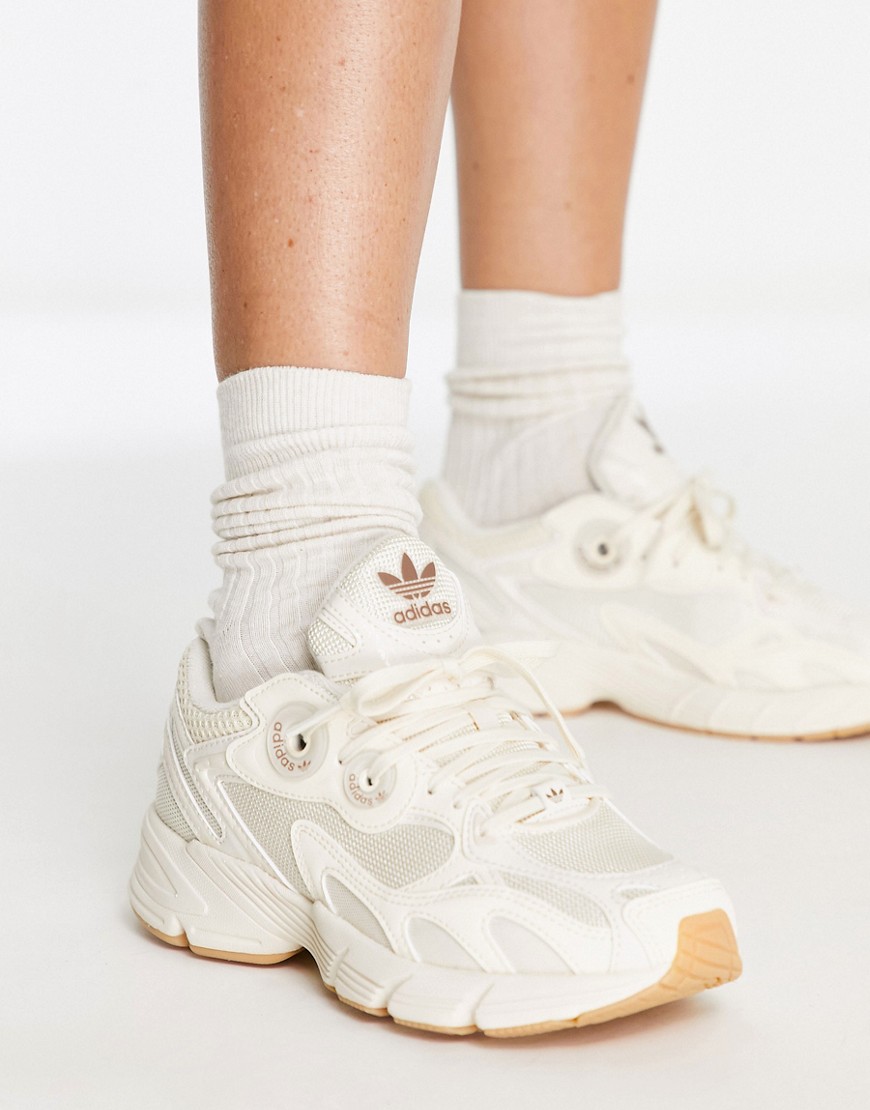 adidas Originals Astir trainers in off white with gum sole