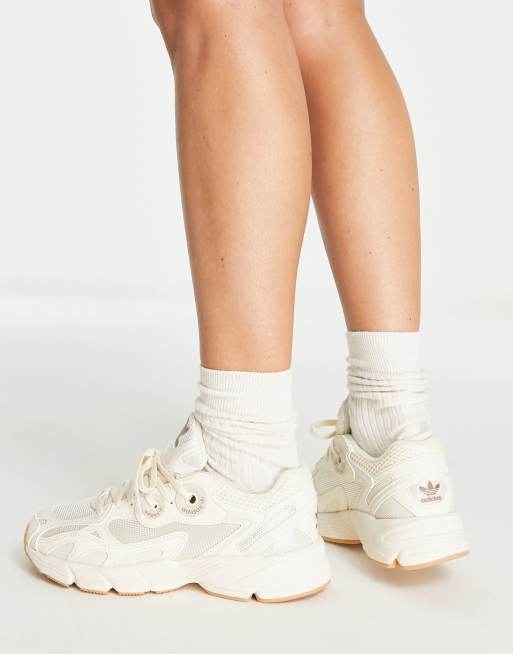 adidas Originals Astir trainers in off white with gum sole