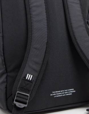 the brand with the three stripes bag