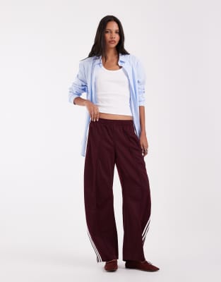 adidas Originals barrel leg firebird track pants in burgundy