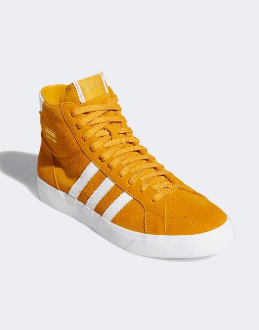 Yellow adidas sale high tops