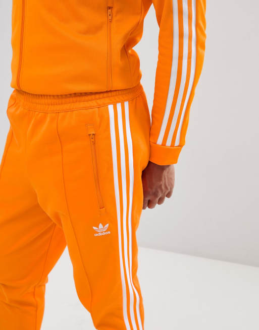 Survêtement orange homme hot sale