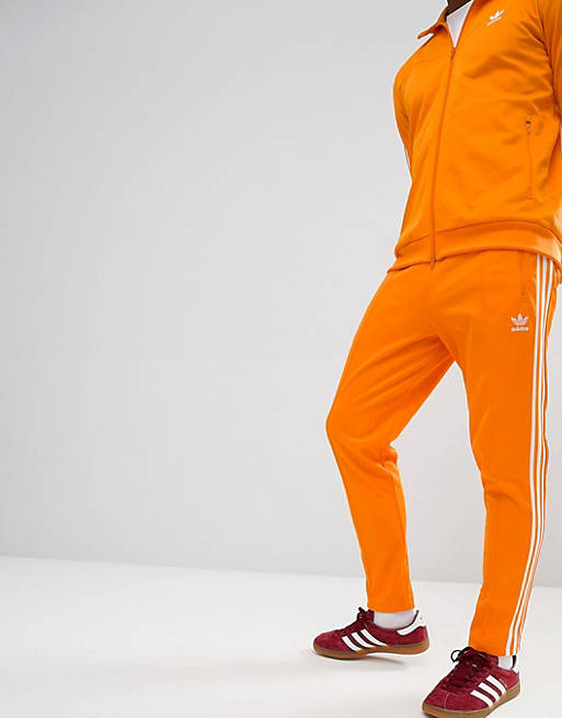 Calvo Paternal corte largo adidas Originals Beckenbauer Sweatpants In Orange DH5819 | ASOS