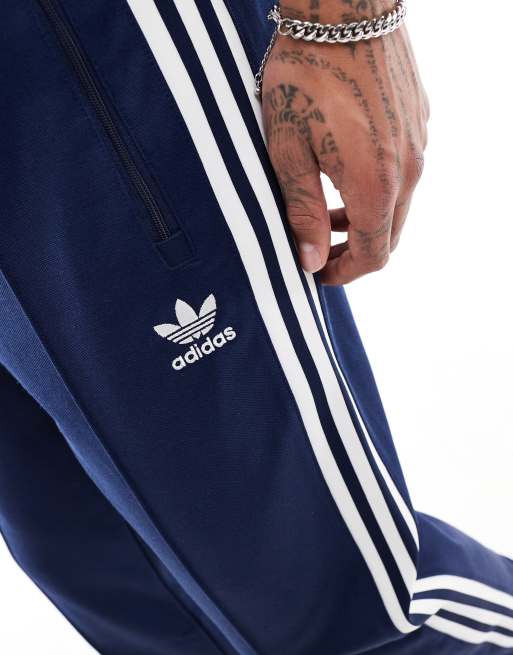 adidas Originals Beckenbauer tracksuit bottoms in indigo ASOS