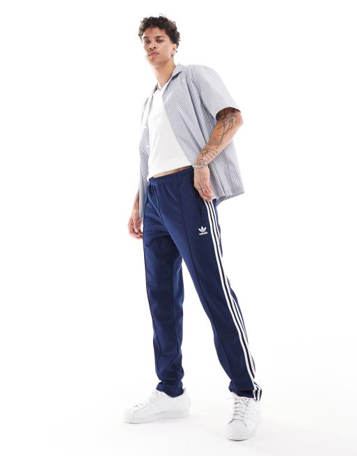 adidas Originals Beckenbauer tracksuit bottoms in indigo ASOS