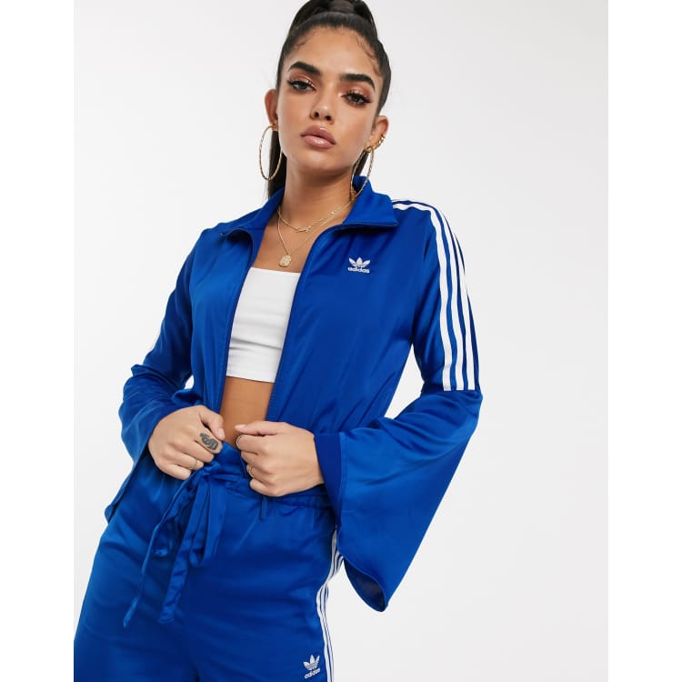 adidas Originals Bellista bell sleeve track jacket in blue
