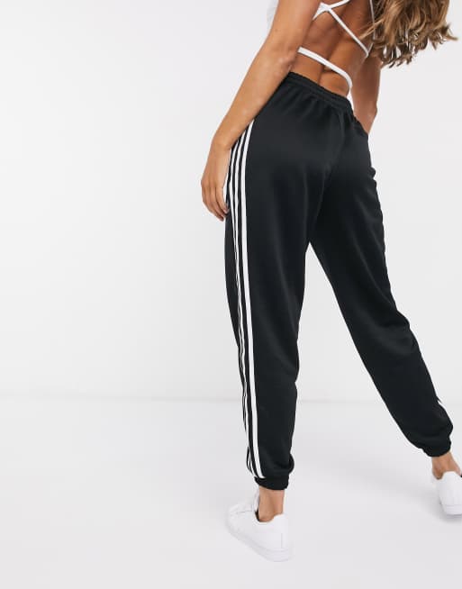 adidas Originals Bellista three stripe cuffed joggers in black ASOS