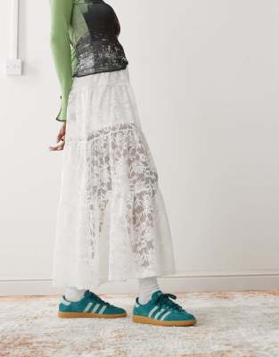adidas Originals Bermuda sneakers in dark green