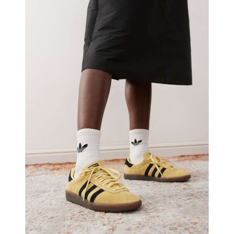 adidas Originals Bermuda trainers in yellow and black