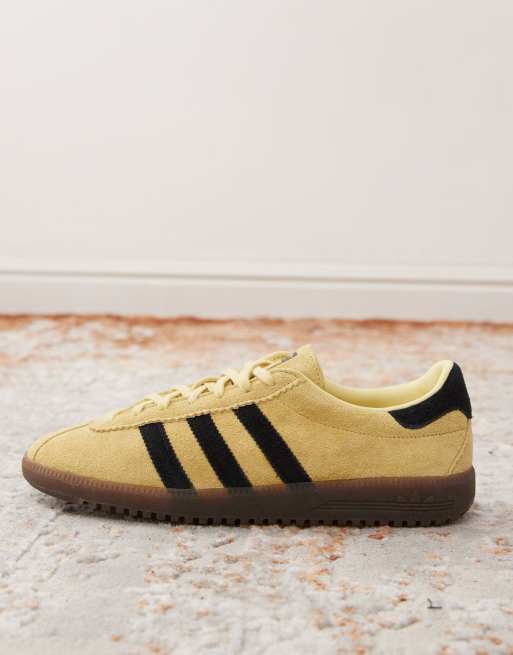 adidas Originals Bermuda trainers in yellow and black