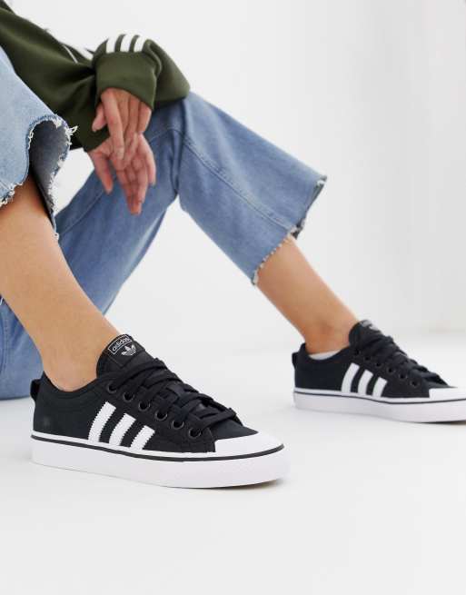 Adidas originals black on sale and white nizza trainers