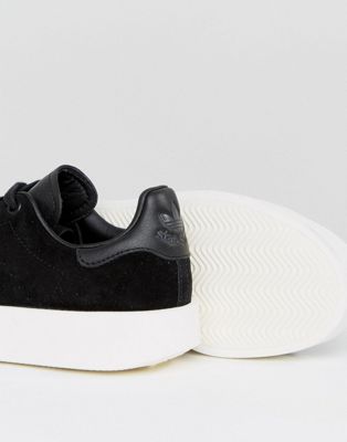 black adidas trainers with white sole