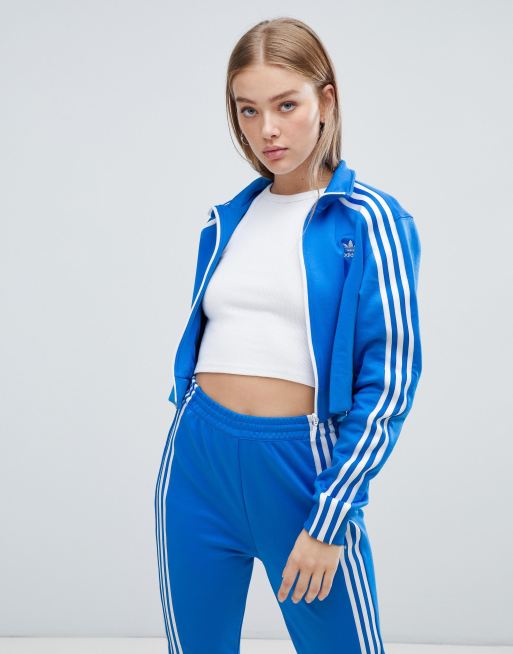 adidas Originals - Blaue Trainingsjacke mit drei Streifen ...