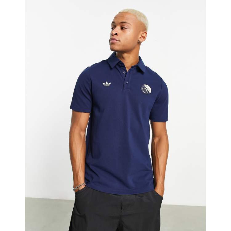 adidas Originals Blokepop patch logo polo shirt in navy