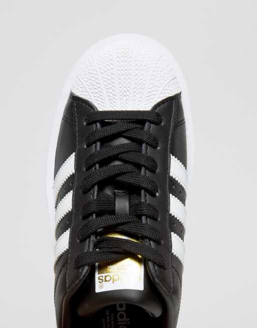 Black adidas shop superstar white sole