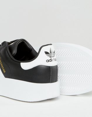 adidas black trainers with white sole