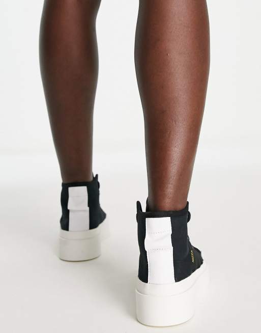 adidas Originals Bonega Nizza mid platform trainers in black