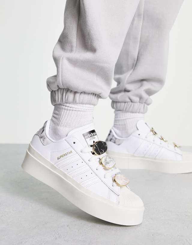 adidas Originals Bonega sneakers in white with removable lace clips