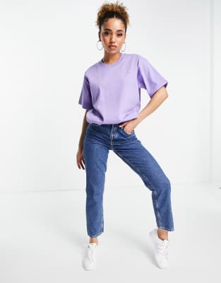 purple top with blue jeans