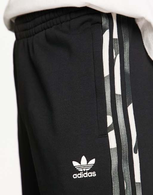 adidas Originals Camo sweatpants in black ASOS