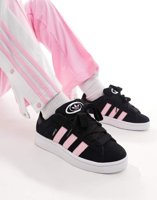 Black adidas with pink hot sale soles