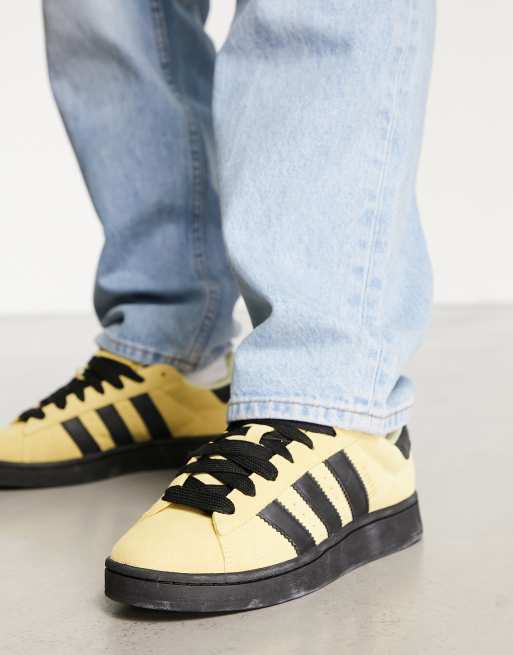 Black adidas 2024 shoes with yellow