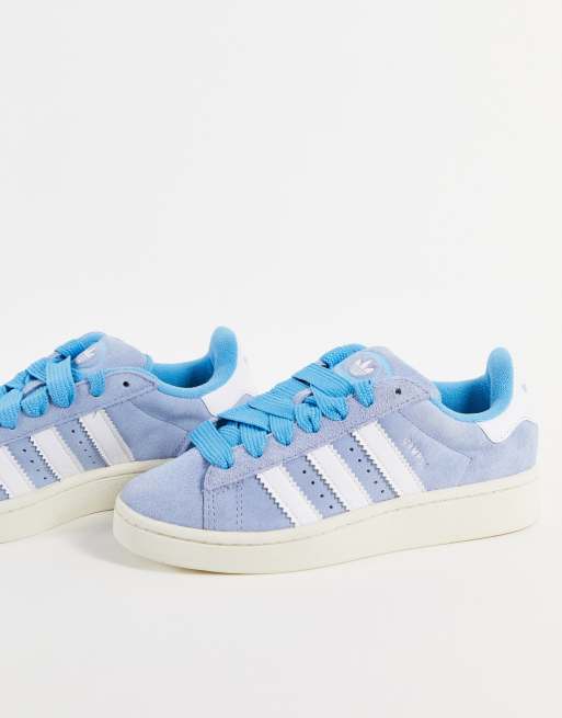 Pale blue adidas store trainers