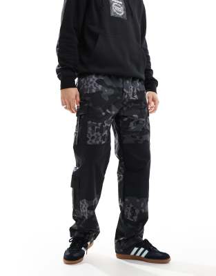 adidas Originals cargos in black with camo detail