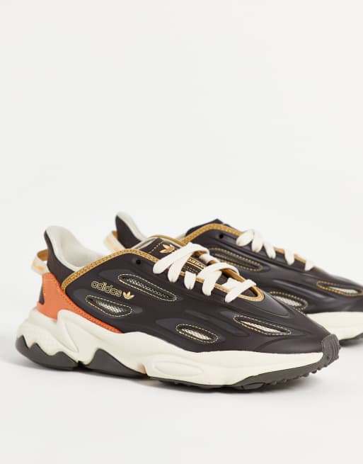 adidas Originals – Celox – Brązowe buty sportowe z pomarańczowymi wstawkami