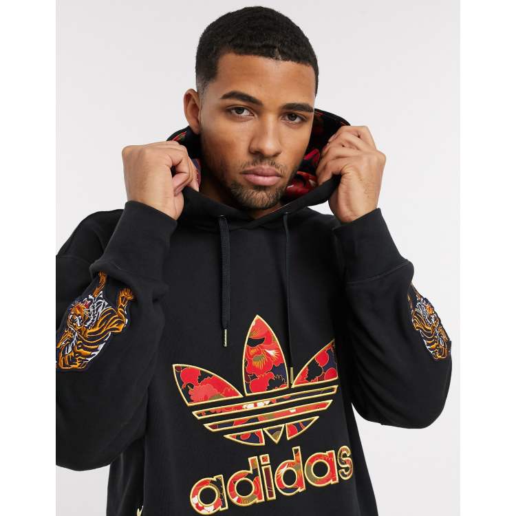 adidas Originals chinese new year hoodie with gold trefoil logo