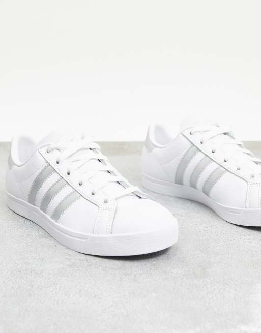 White adidas sale with silver stripes