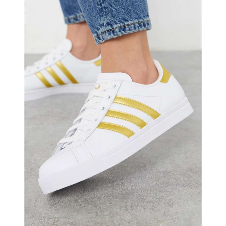 Adidas schuhe schwarz cheap mit goldenen streifen