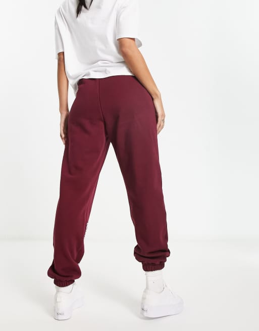 adidas Originals collegiate joggers in burgundy