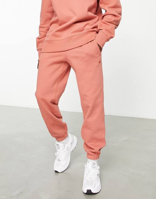 adidas Originals Contempo trefoil trackies in orange