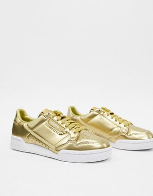 gold adidas trainers