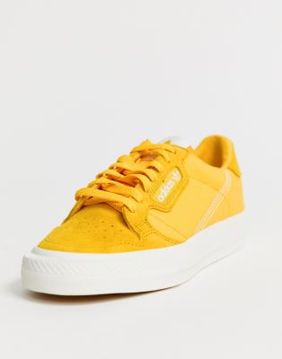 yellow adidas continental 80