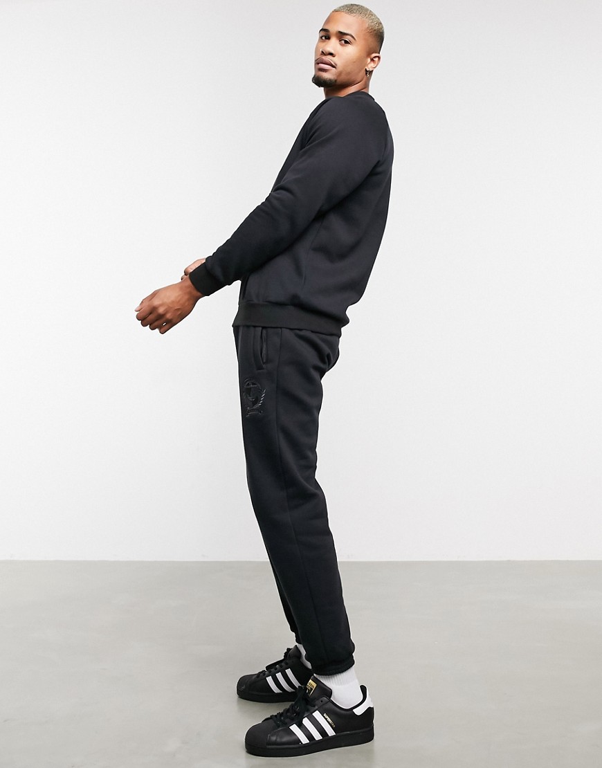adidas Originals coordinating sweatpants with collegiate crest in black fleece
