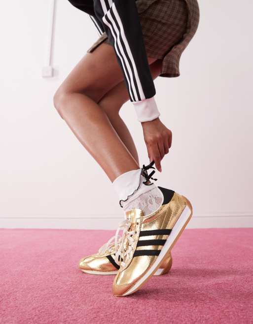 adidas Originals – Country OG – Guldmetalliska och svarta sneakers
