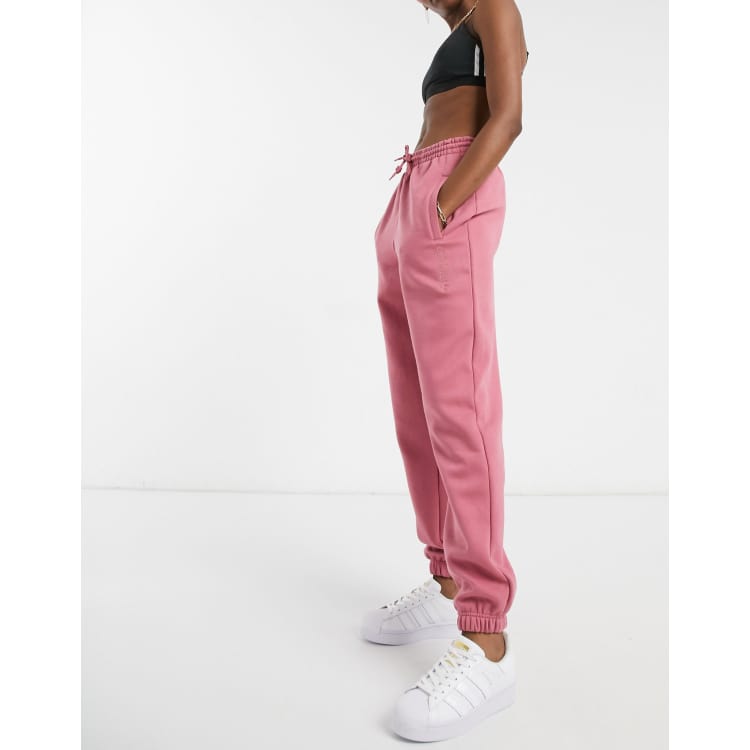 Adidas originals new neutrals logo shop cuffed sweatpants in pink