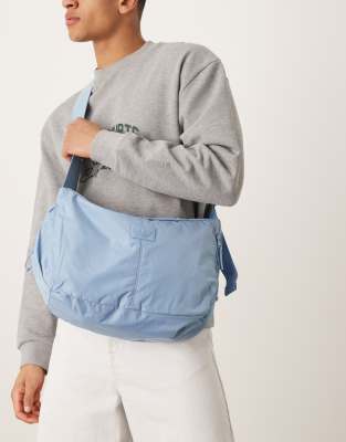crescent crossbody bag in light blue