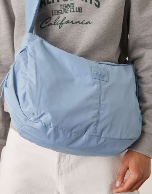 adidas Originals crescent crossbody bag in light blue | ASOS