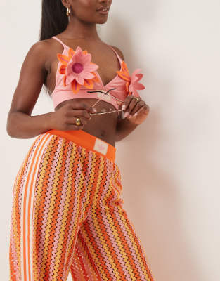 adidas Originals crochet track pants in pink and orange