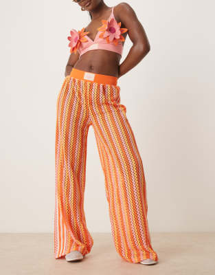 adidas Originals crochet track pants in pink and orange