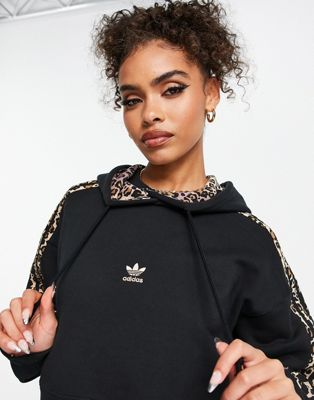 adidas Originals cropped hoodie with leopard print stripes in black