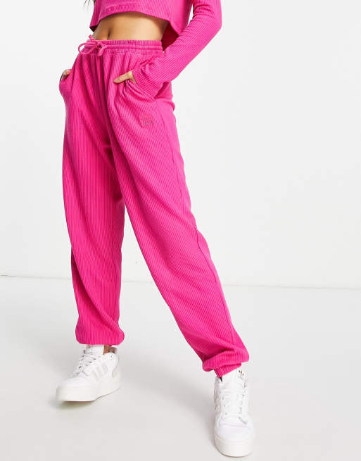 adidas Originals cuffed trackies in pink | ASOS