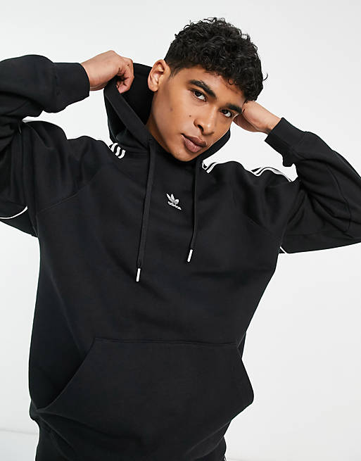 adidas Originals cut three stripe Rikeve hoodie in black | ASOS