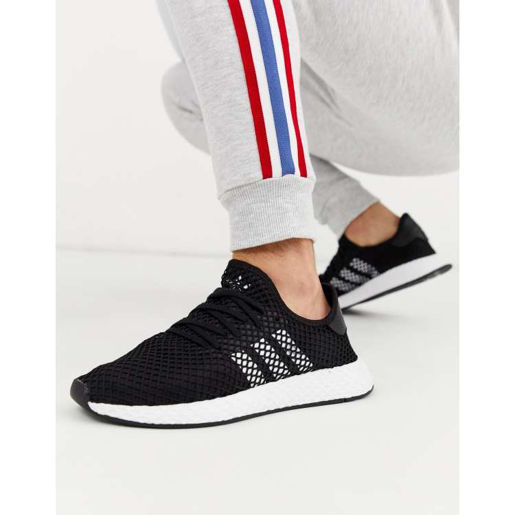 Adidas deerupt bianche con strisce nere on sale