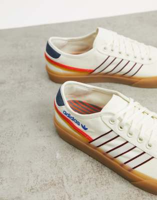 adidas Originals Delpala Happy Camping sneakers in off white | ASOS