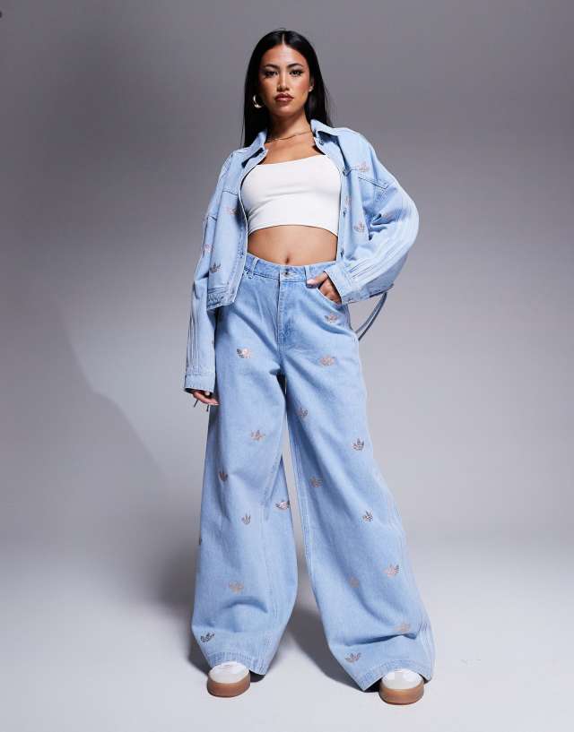 adidas Originals denim jeans with rhinestone embellishment in