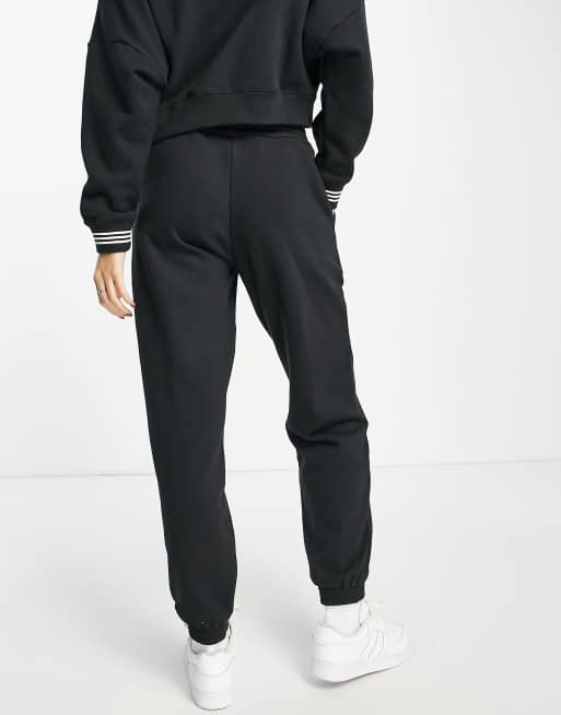 adidas Originals Disney joggers in black